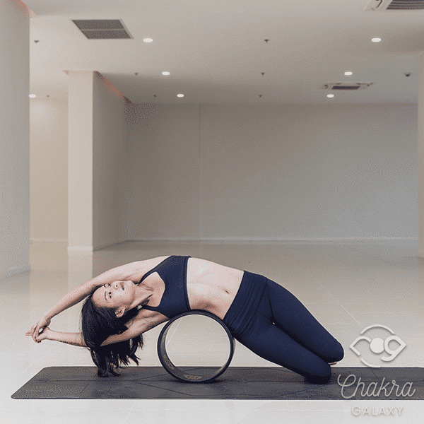 Yoga Wheel Assisted Side Bend Pose (Urdhva Hastasana)