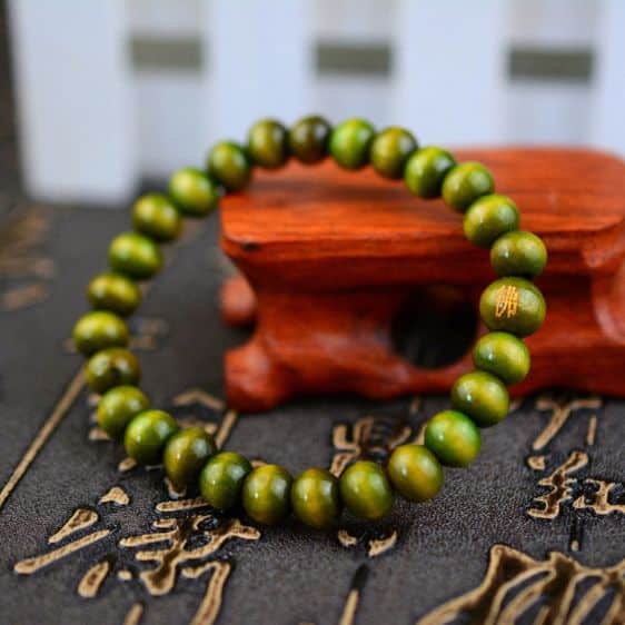 8mm Green Sandalwood With Carved Buddha Symbol Meditation Bracelet - Charm Bracelets - Chakra Galaxy